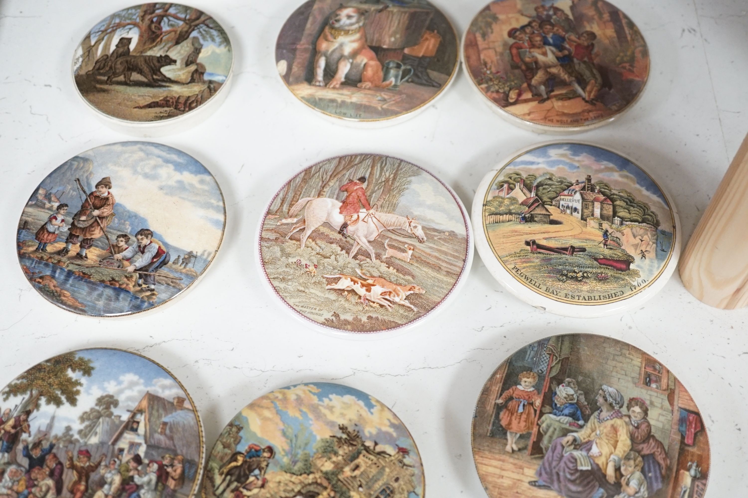 A collection of 20 Victorian pot lids